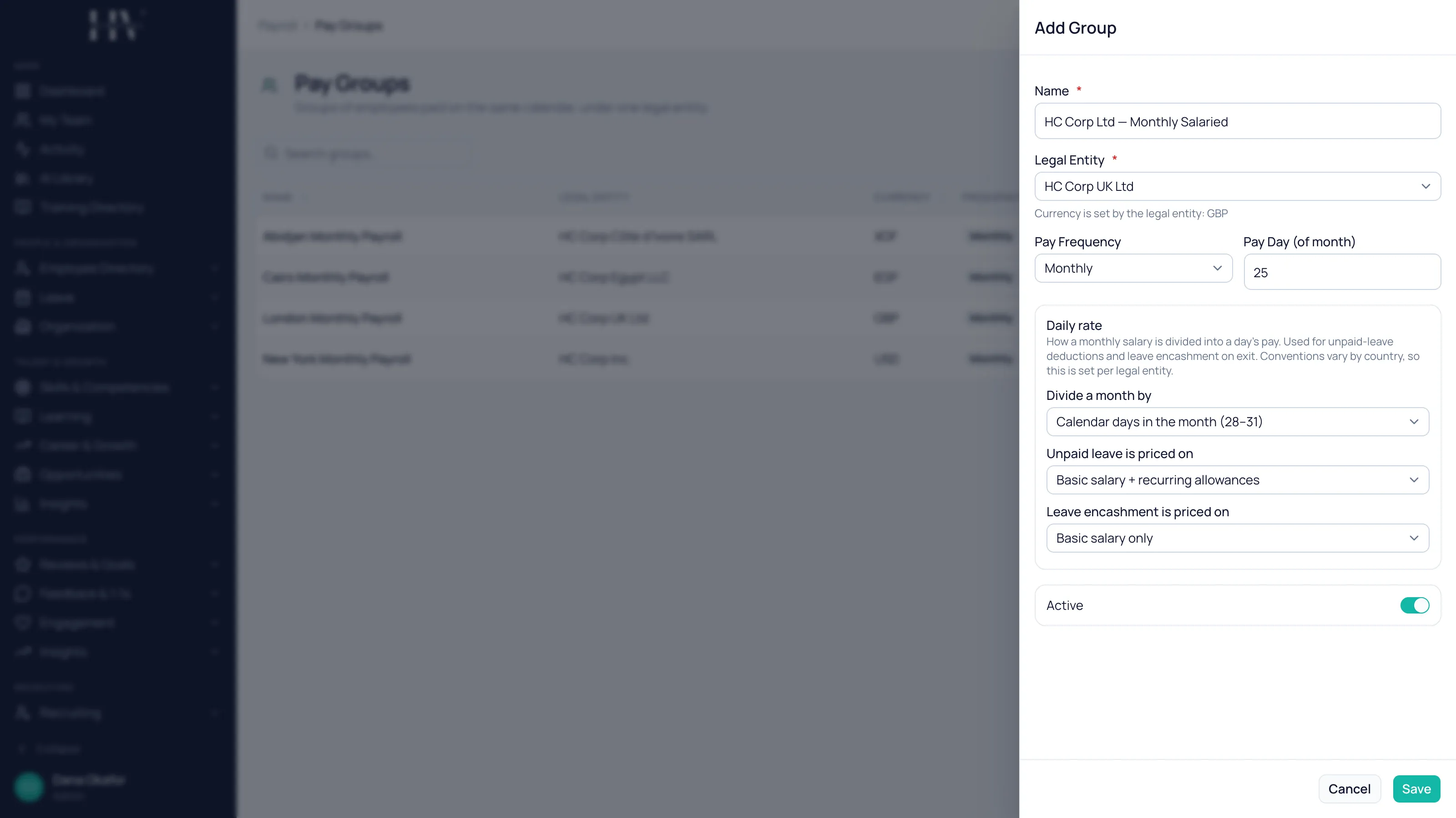The Add Group form naming a monthly salaried pay group against the UK legal entity, with the hint that currency is set by the legal entity to GBP, a Monthly frequency and a pay day of 25.